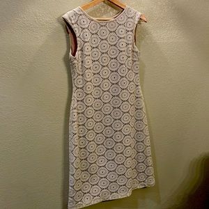 Cream colored sheath dress. Sleeveless. Fully lined. Womens size 4.